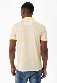 Felix Hardy Poloshirts - yellow