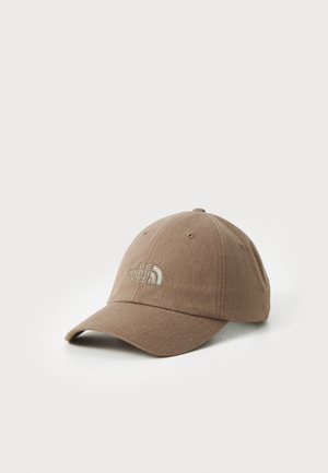 Brown cap made of fabric, featuring a curved brim and six-panel design. Displays "The North Face" logo in light stitching on front.