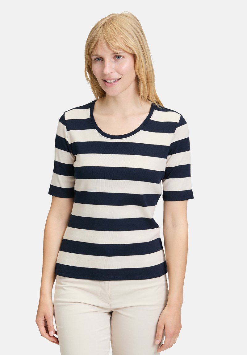 Navy and cream striped short-sleeve top with a round neckline and ribbed texture, fitted design.