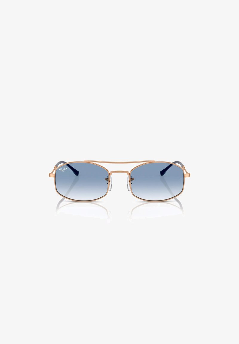 Occhiali da sole Ray-Ban con montatura in metallo dorato, lenti ovali a gradiente blu, supporti nasali e dettagli decorativi sulle tempie.