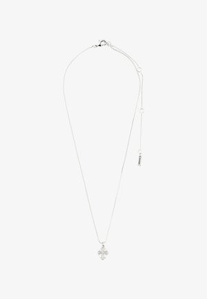 Collier en chaîne argentée avec un pendentif en croix présentant des détails raffinés. Longueur ajustable avec une petite étiquette près du fermoir.