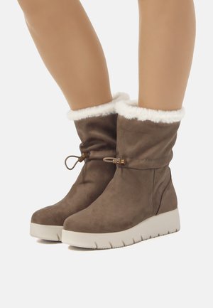Botas para la nieve - marron