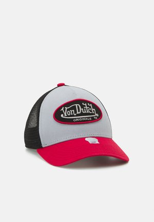 Grey and red cap with a black mesh back, featuring a prominent black oval patch with white text "Von Dutch Originals". Curved red brim.