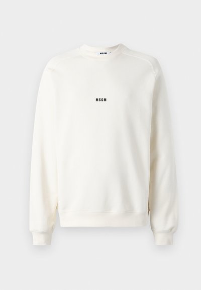 Cream-colored sweatshirt with a crew neckline, ribbed cuffs, and hem. Features a small black "MSGM" logo on the chest. Smooth texture.