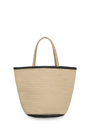 Sac cabas en paille tissée beige avec garniture noire en haut et en bas, doté de deux poignées tressées de longueur moyenne.