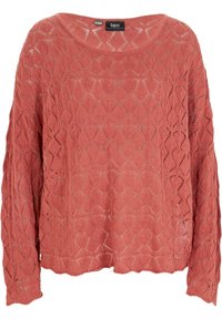 Suéter de punto en color coral rosa con corte holgado, que presenta un patrón de rombos abierto y mangas amplias. Con dobladillo escalloped en la parte inferior.