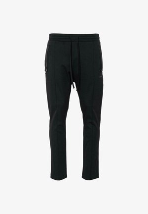 Juodi taperio tipo sportiniai džinsai, pagaminti iš minkštos medžiagos, su elastinga juosta, raišteliu ir dviem užtrauktukais uždarytomis šoninėmis kišenėmis saugiam daiktų laikymui.