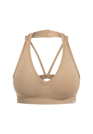Soutien-gorge de sport beige avec un décolleté en V, doté d'un dos entrecroisé et d'une texture côtelée. Sans rembourrage, construction sans coutures et étiquette logo à l'ourlet.