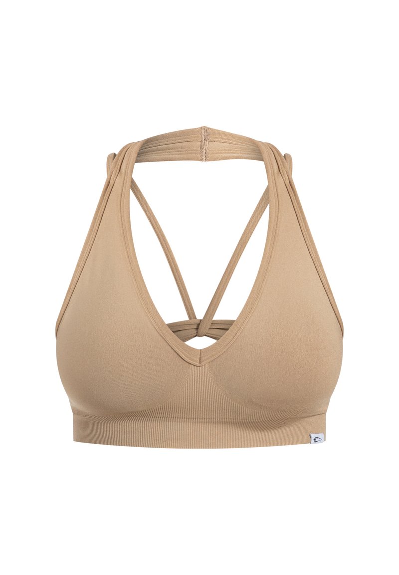 Soutien-gorge de sport beige avec un décolleté en V, doté d'un dos entrecroisé et d'une texture côtelée. Sans rembourrage, construction sans coutures et étiquette logo à l'ourlet.