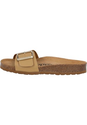 Beige Riemensandale mit einem breiten Riemen und silberner Schnalle. Korkfußbett und Gummisohle mit einer strukturierten Oberfläche für besseren Halt.