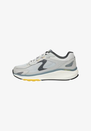 Gray athletic shoe featuring a mesh upper, yellow accents on the sole, a padded collar, and black rubber outsole for traction.