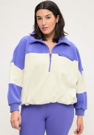 Fleece half-zip pullover in lichtcrème en lavendel, met een hoge kraag, lange mouwen en een cropped fit met geribde manchetten.