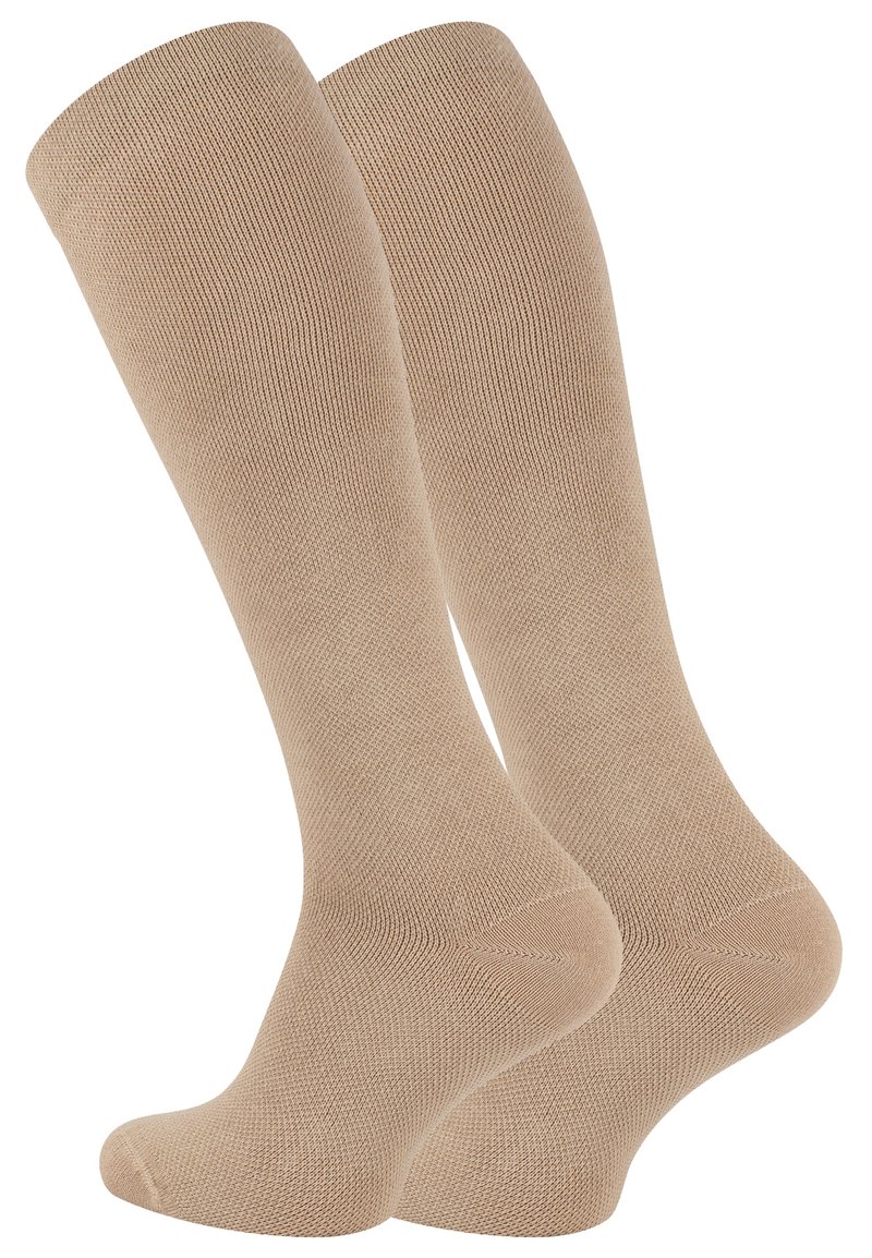 Calze beige al ginocchio realizzate in un morbido materiale testurizzato, caratterizzate da un design senza cuciture e punta rinforzata per una maggiore durata.