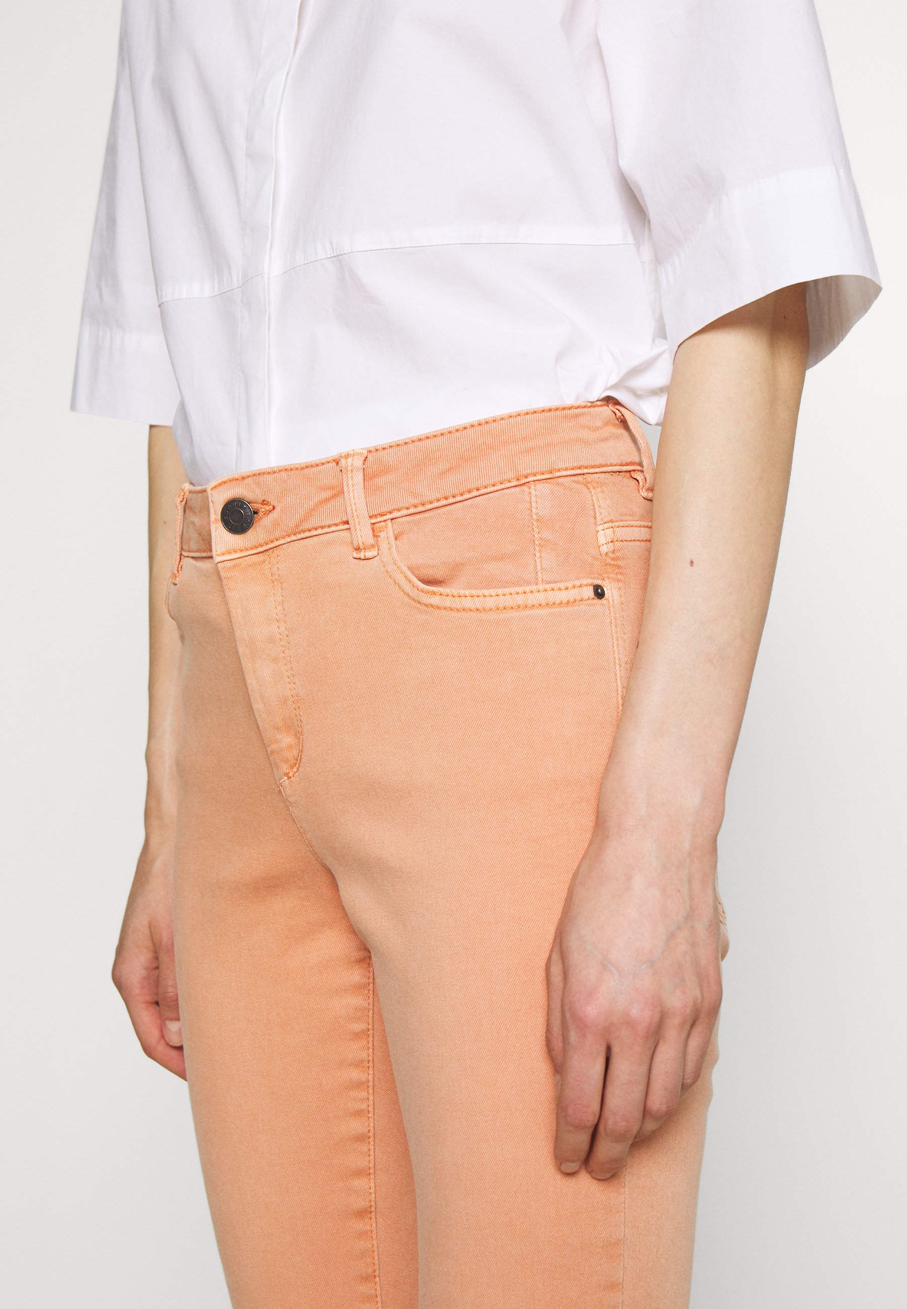 rust orange jeans