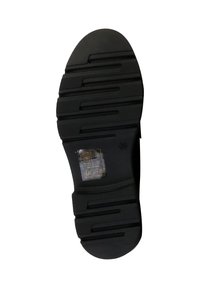 Sort gummisål med teksturerede riller, en glat afrundet tå og en klar etiket, der angiver plejeinstruktioner.