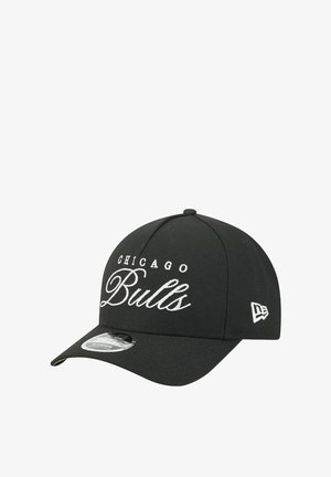 Black baseball cap with an embroidered "Chicago Bulls" logo in white script, featuring a curved visor and a side logo detail.