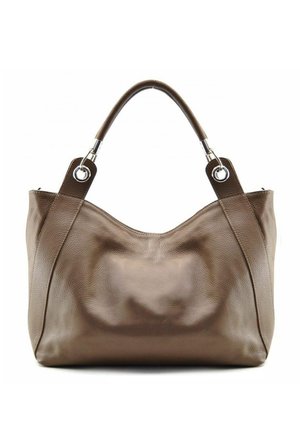 Sac à main en cuir marron avec des poignées arrondies attachées par des anneaux argentés, présentant une forme rectangulaire légèrement affaissée et une texture lisse.