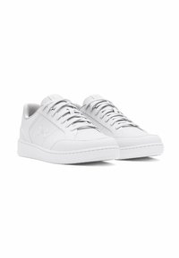 White athletic shoes with smooth leather uppers, round toes, and textured rubber soles. Features woven lace-up design and minimal branding.