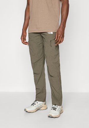 Lightweight, loose-fitting olive green cargo pants with zip pockets. Made from durable fabric, featuring a relaxed silhouette and breathable texture.
