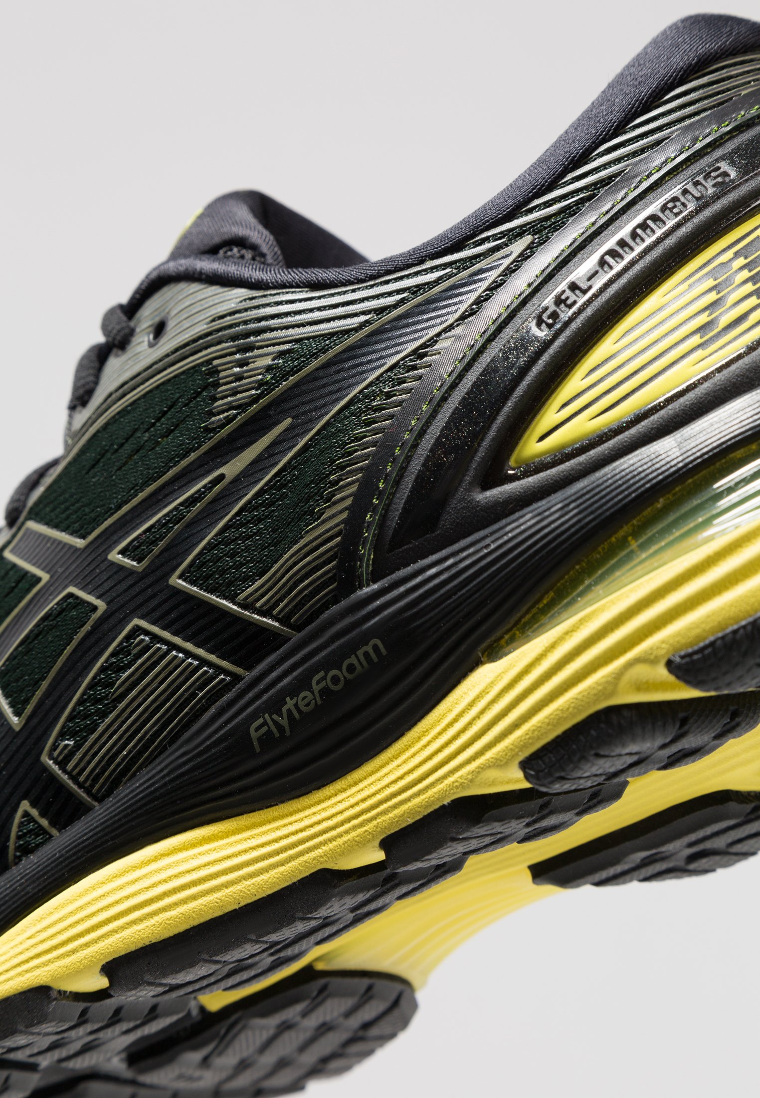 ASICS GEL-NIMBUS 21 - Neutral running shoes - black/lemon spark - Zalando.ie