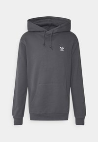 Šedá mikina s kapucí a klokaní kapsou, s žebrovanými manžetami a spodním lemem. Na hrudi má malé bílé logo Adidas. Příjemně měkký materiál.