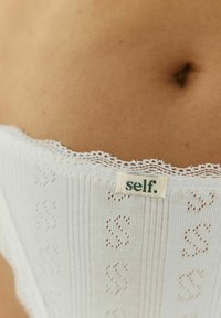 Self. Thong - white