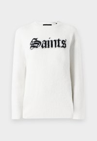 Biały sweter z pluszowego materiału z czarnym napisem "Saints" z przodu. Okrągły dekolt, długie rękawy i detale ściągacza na dolnej krawędzi.