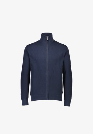 Granatowy sweter zapinany na zamek z wysokim kołnierzem, z teksturowanym splotem, długimi rękawami oraz ściągaczami przy mankietach i dolnym brzegu. Zawiera centralny zamek.