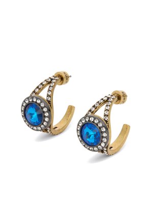 Orecchini in tono oro con una pietra blu centrale circondata da strass trasparenti, con un design curvo e delicati dettagli.