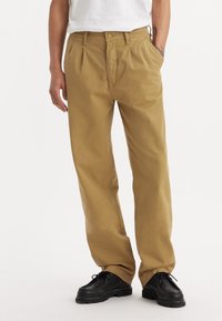 Levi's® - Chinosy