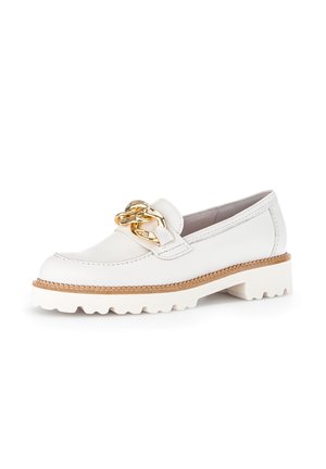 White leather loafers with a chunky gold chain accent, textured sole, and a thick platform. Features stitched detailing and a rounded toe.