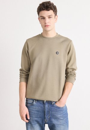 Olive green cotton sweatshirt with a round neckline and long sleeves; features a small black logo on the chest and ribbed cuffs.