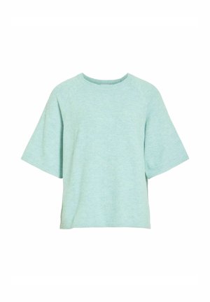 Jersey de punto de manga corta en azul claro con cuello redondo y corte holgado, mostrado sobre fondo blanco.