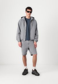 Lacoste Jakna iz džinsa - calcaire