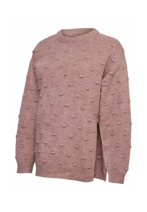 Maglione rosa con una superficie texture, caratterizzato da accenti a pallini in rilievo e un collo a girocollo. Il design ha una vestibilità rilassata e fessure laterali.
