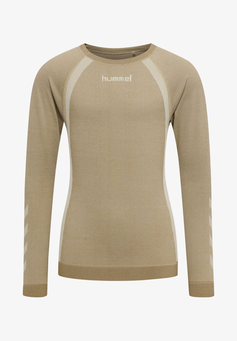 Langærmet atletisk top i beige med cremefarvede accenter, featuring en rund hals, ribbede manchetter og et logo på forsiden.