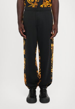 PRINT - Pantalon de survêtement - black/gold