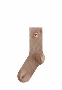 Calzino beige a coste con una finitura testurizzata, caratterizzato da un piccolo design ricamato di una volpe con accenti rossi sul lato.