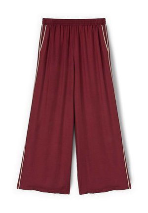 Pantalon bordeaux à jambes larges avec taille élastique et bandes blanches latérales, avec poches sur les côtés.