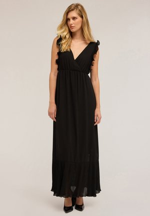 Robe maxi noire avec ourlet plissé, décolleté en V et manches volantées. Fabriquée dans un tissu lisse, avec une taille cintrée et une jupe fluide.