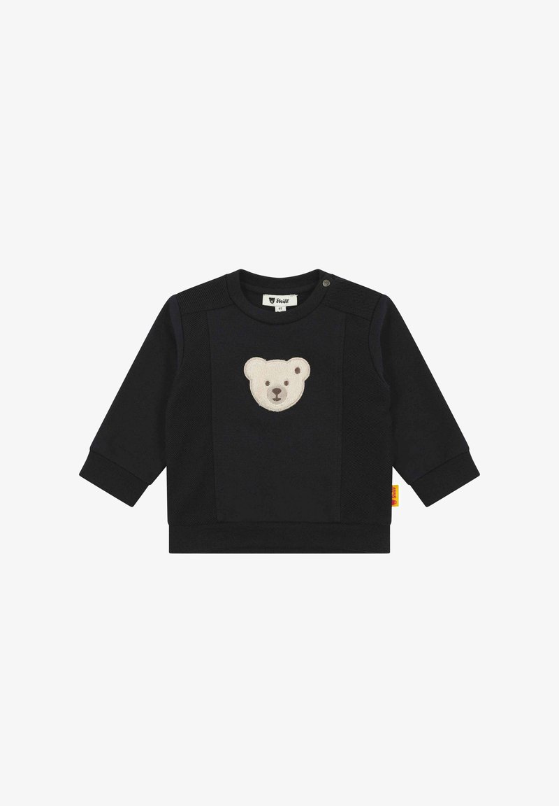 Schwarzer Sweatshirt mit einem Bärenkopf-Applikation in Beige in der Mitte, Rundhalsausschnitt, langen Ärmeln und Druckknopfdetail an der Schulter.