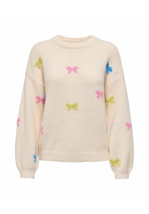 Crème-kleurige trui met een gestructureerde afwerking, featuring kleine meerkleurige strikpatronen in roze, groen en blauw doorheen.