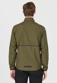 Endurance HUGOEE - Løbejakker - ivy green