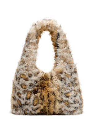 Sac à main doux et moelleux avec un motif léopard et une large poignée arrondie conçue pour être portée à la main ou à l'épaule.