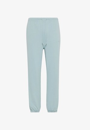Pantalones jogger azul claro hechos de tela suave. Cuentan con una cinturilla elástica con cordones y puños en los tobillos. Marca mínima.
