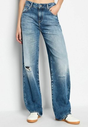 Jeans a zampa - denim