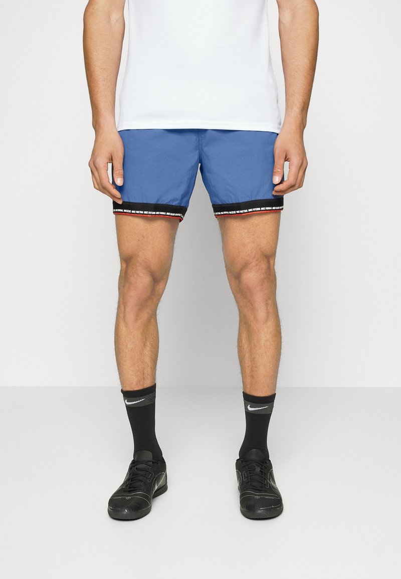 Nike Performance Pantalón corto de deporte - blue