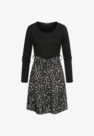 Rochie neagră cu maneci lungi, cu un top texturat și o fustă evazată, decorată cu un imprimeu floral în alb și roz, strânsă în talie cu un șnur.