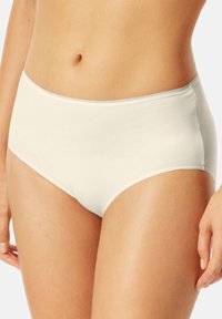 Beige high-waisted cotton brief with a smooth texture, featuring a simple design and a narrow elastic waistband. No visible patterns or hardware.