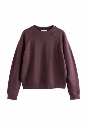 Vinrød sweatshirt lavet af struktureret stof, med rund halsudskæring, raglanærmer og et cropped design med ribbede mansjetter og kant.